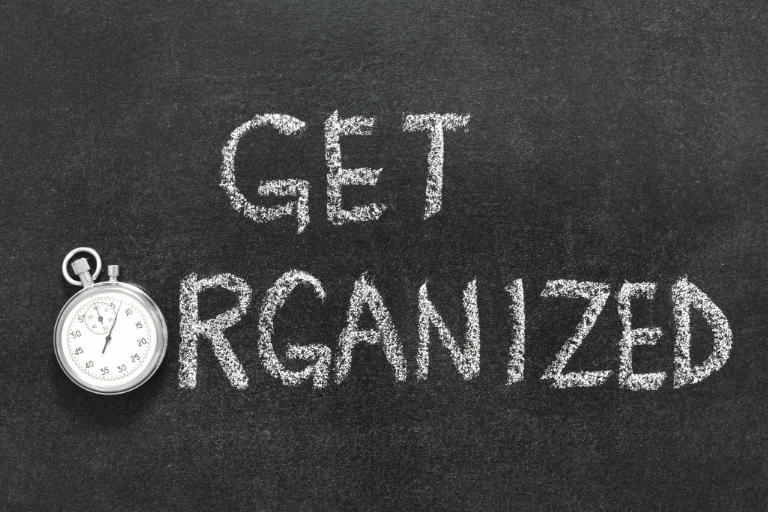 Stopwatch and “Get Organized” message illustrating the time savings achieved through good organization in the laboratory.